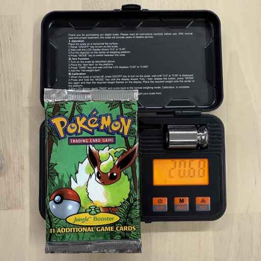 Alternative view of [Auksjon] Pokemon 1999 Jungle Booster Pack [20,68g]