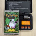 Alternative view of [Auksjon] Pokemon 1999 Jungle Booster Pack [21,04g]