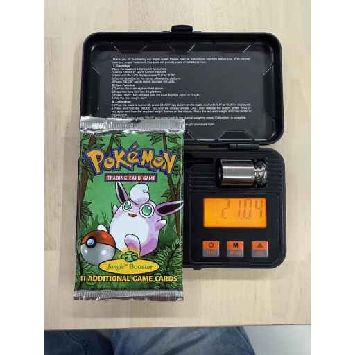 Alternative view of [Auksjon] Pokemon 1999 Jungle Booster Pack [21,04g]